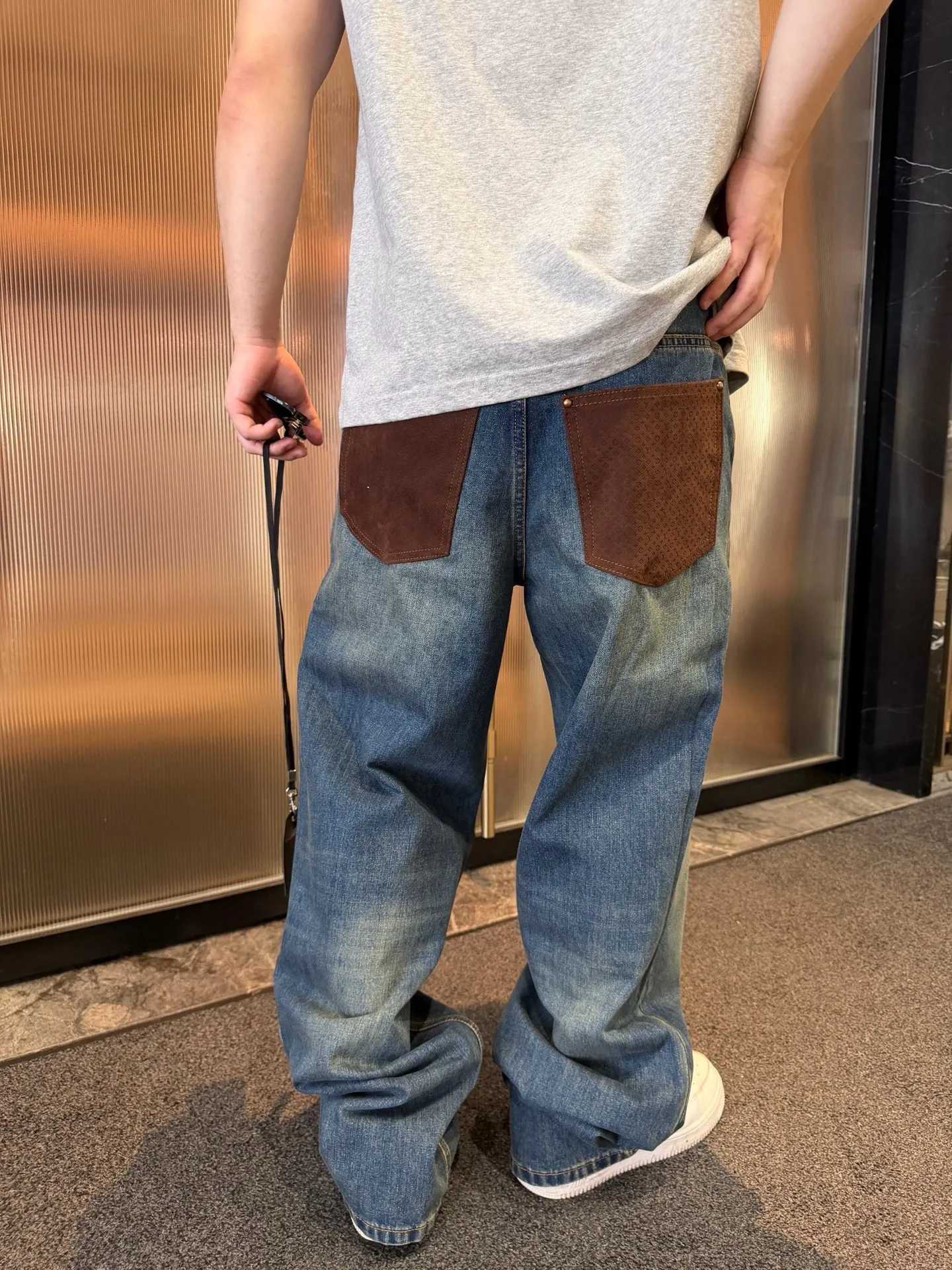 Louis Vuitton/Louis Vuitton back pocket leather jeans